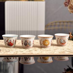 Tasses à thé en céramique réutilisables, lot de six petites tasses, idéales pour les dîners de famille, les banquets et les cadeaux, parfaites pour le thé de l'après-midi, avec illustrations créatives. - Product Image 4