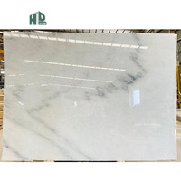 Dalles de marbre blanc de luxe polies miroir, prix d'usine en gros, pour comptoirs de cuisine et tables basses