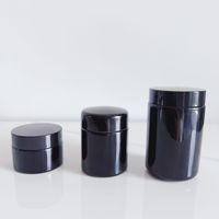 Tarro de cristal cilíndrico negro personalizable al por mayor, esmerilado, de 3.5 gramos, para almacenamiento de flores, 2oz 3oz 4oz, a prueba de olores, a prueba de niños
