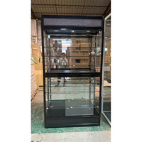 Vitrine en verre trempé de haute qualité, durable, facile à nettoyer, écologique, mobile, verrouillable, avec éclairage LED et écran LED pour boutique de tabac
