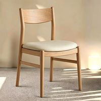 Chaise de salle à manger mobile en bois massif de style rétro, luxe léger, siège rembourré en cuir PU, dossier confortable, design simple