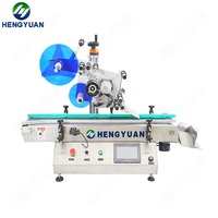 Applicateur d'étiquettes adhésives automatique de table haute précision HYTB1-100T-D pour colle non sèche |   Bouteilles en verre à surface plane
