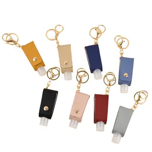 Wholesale PU leather key chains bag hanging Accessory Multi-functional Customized Portable hand sanitizer holster