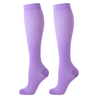 Chaussettes de compression unies mi-hautes pour femmes, bas longs unis, en nylon et élasthanne lisses, avec bord supérieur confortable, approvisionnement en gros OEM