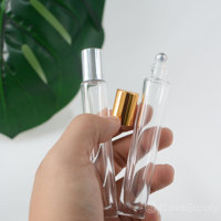 Venta al por Mayor de Botellas de Vidrio Transparente Redondas y Largas de 10 ml con Tapa Dorada/Plateada para Perfumes y Aceites Esenciales