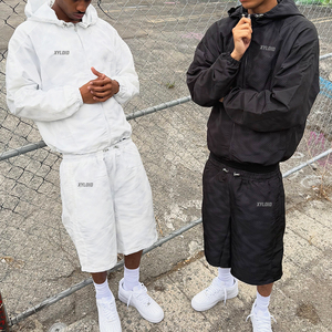 Ensemble de survêtement coupe-vent personnalisé avec impression numérique intégrale, veste coupe-vent imperméable à fermeture éclair et short de jogging - Product Image 1