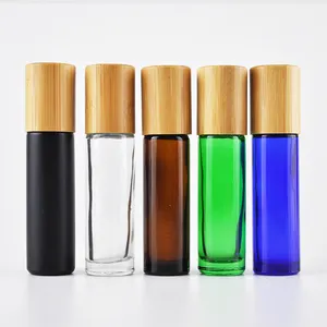 5ml 10ml 15ml Transparent Refillable Glass Essential Oil Roll On Bottle With Steel Roller Ball And Bamboo Lid