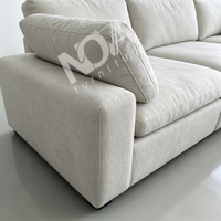 Canapé modulaire en forme de L, style crème, en tissu, avec rembourrage en fibres moelleuses