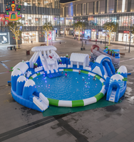 Parc aquatique gonflable commercial extérieur personnalisé en usine avec toboggan aquatique, piscine, jeux du monde des glaces et de la neige