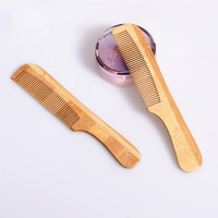 Peigne à dents larges avec logo personnalisé en gros Peigne à cheveux en bois de bambou naturel bon marché pour hôtel