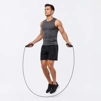 Corde à sauter réglable en fil d'acier avec poignées en PVC pour entraînement fitness à domicile et en salle de sport