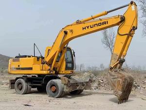 Excavatrice sur pneus Hyundai 210W d'occasion de haute qualité, 21 tonnes, avec attache rapide, brise-roche et tarière, certifiée CE, Daewoo - Product Image 2