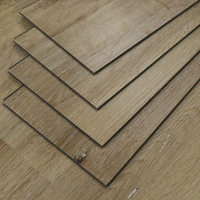 Plancher en vinyle rigide SPC à clipsage étanche pour la décoration intérieure des hôtels et résidences