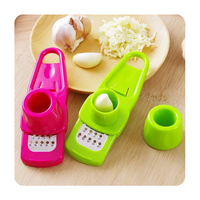 Dropshipping Europe Accessoires de cuisine en plastique Eplucheur en silicone magique Trancheuse Râpe à gingembre Outil de broyage d'ail