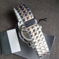 Montre élégante pour homme d'affaires, chronographe multifonction, cadran argenté, bracelet bicolore, étanche 5 ATM, montre-bracelet à quartz