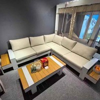 Ensemble de canapés modernes 5 places en aluminium pour l'extérieur Table en bois de teck massif Mobilier de patio arabe de jardin en tissu pour la salle à manger et la cour