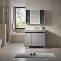 Meuble-lavabo mural pour salle de bain avec pieds métalliques surélevés, support robuste, design flottant, nettoyage facile, armoire avec miroir et rangement
