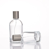 Bouteille de parfum en verre transparent de luxe 30ml/50ml/100ml forme unique rechargeable vide atomiseur pompe pulvérisateur sérigraphie 100 pièces