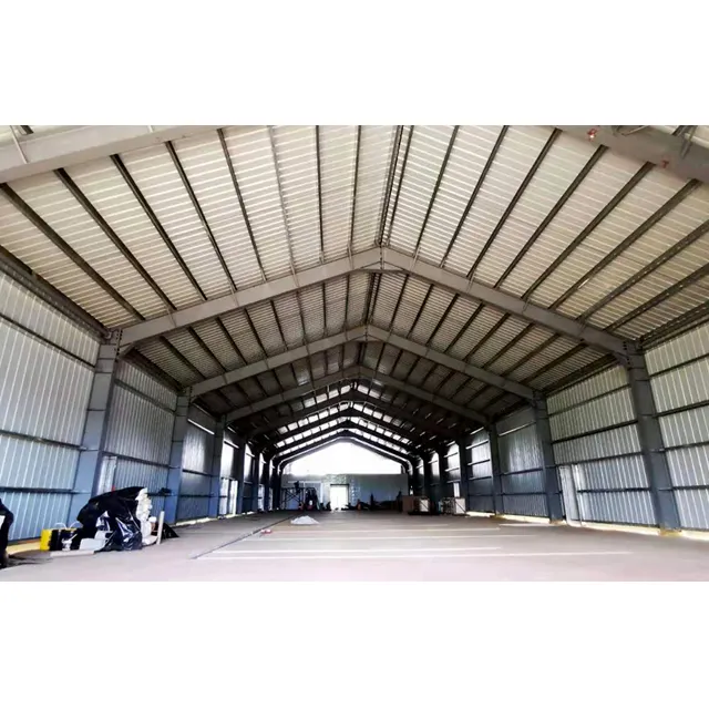 Prezzo prefabbricato modulare su misura del magazzino dell'edificio prefabbricato della struttura d'acciaio dell'officina dell'hangar della fabbrica della struttura del metallo industriale
