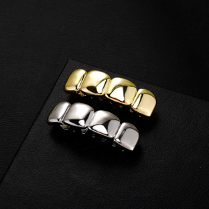 Grillz para dientes, cuatro piezas, brillantes, en forma de U, de oro y plata, decorativos, unisex, para uso diario. - Product Image 1