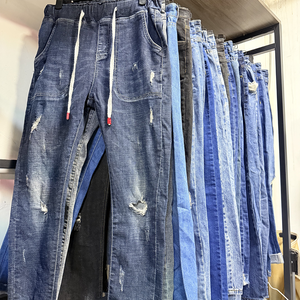 Vente en gros usine de vêtements d'occasion pour femmes et hommes : Jeans skinny, jeans déchirés en coton, lots de surplus en liquidation, et jeans baggy pour femmes. - Product Image 2