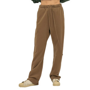Pantalon de jogging unisexe ample et large en coton mi-lourd, avec logo vintage gaufré personnalisé, coupe droite évasée et coloré - Product Image 1