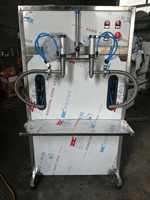 Machine de remplissage de baril de lait d'eau liquide minérale de boisson de lotion de grand volume de 5 litres Remplisseuse à piston vertical à double tête