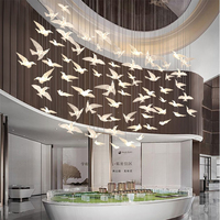 Nouvelle conception de lustre suspendu en acrylique LED moderne personnalisé pour la décoration des escaliers de la villa du hall de l'hôtel