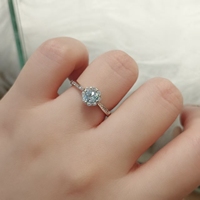 Bague de fiançailles et de mariage tendance en argent sterling 925 avec halo de cercles concentriques incrusté de zircon bleu et sertissage pavé