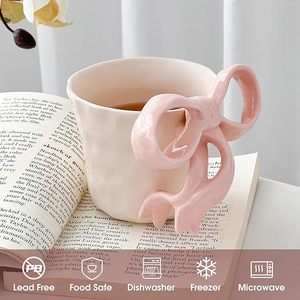 Mignonne tasse en céramique pour lait, réutilisable, avec poignée en forme de nœud, compatible lave-vaisselle et micro-ondes, pour le bureau, la maison, le café - Product Image 3