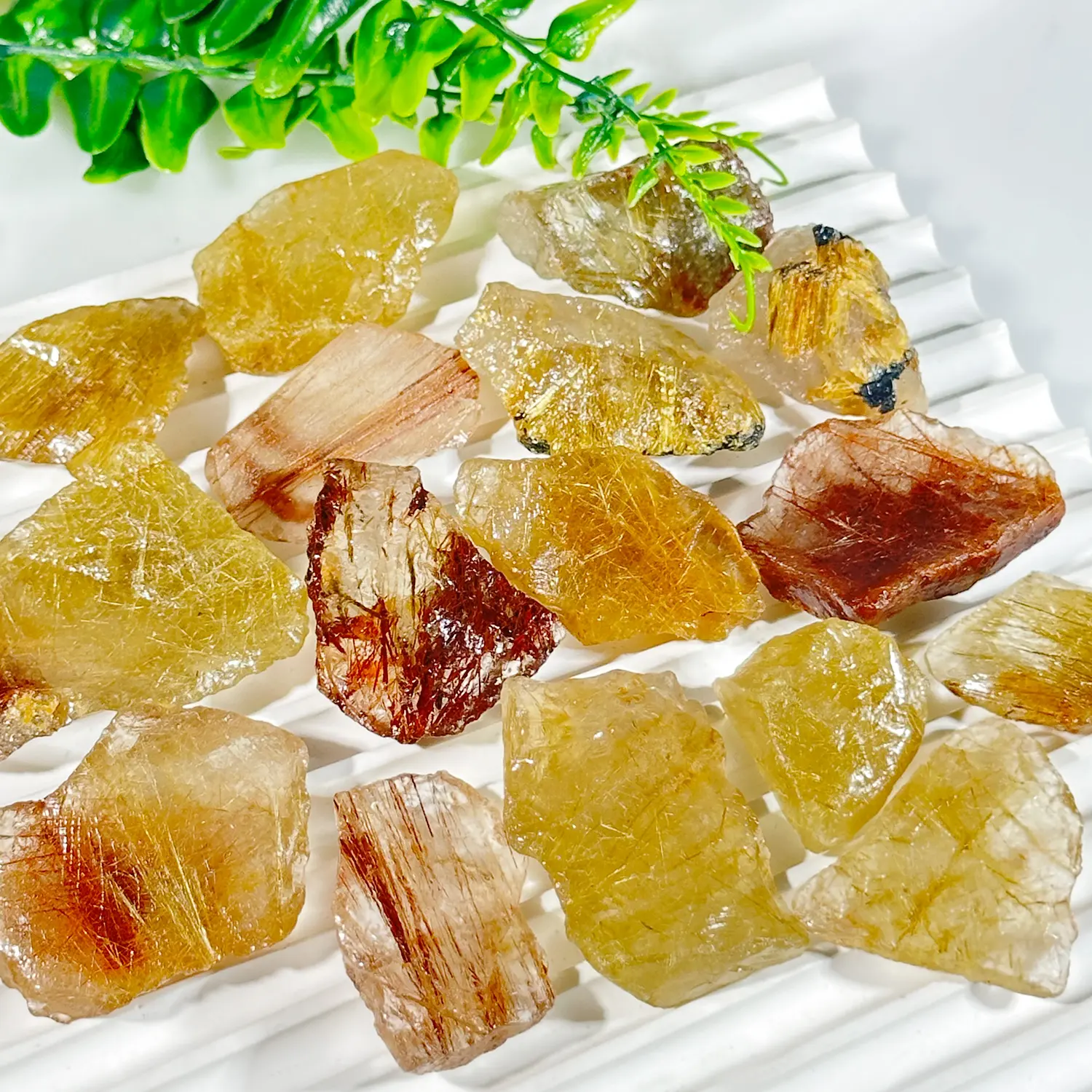 Venta al por mayor de cristal natural de alta calidad Piedra en bruto nuevo Cristal de oro de Cuarzo rutilado pulido amarillo Cristal de pelo para la venta