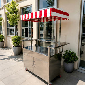 Carrito de Comida Móvil Comercial de Acero Inoxidable con Toldo a Rayas Rojas y Blancas y Mostrador de Vidrio para Servicio de Buffet - Product Image 1