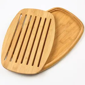 Eco-friendly Adjustable Kitchen Oval Bamboo Slotted Bread Board with Removable Crumb Grid Bread Cutting Board with Crumbs Tray