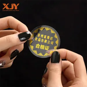 XJY golden frame Custom label design logo printing round gold foil stickers roll self adhesive waterproof sticker