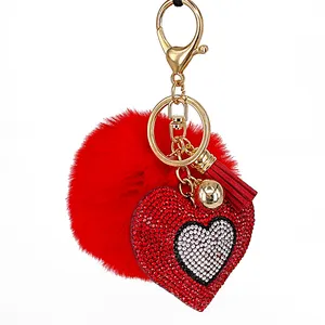 Accessori per borse all'ingrosso portachiavi con soffio di cristallo a cuore carino portachiavi personalizzato con Pom Pom