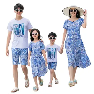 Venta al por mayor de talla grande familia hawaiana Luau hombres mujeres niña niño ropa a juego trajes para vacaciones familiares