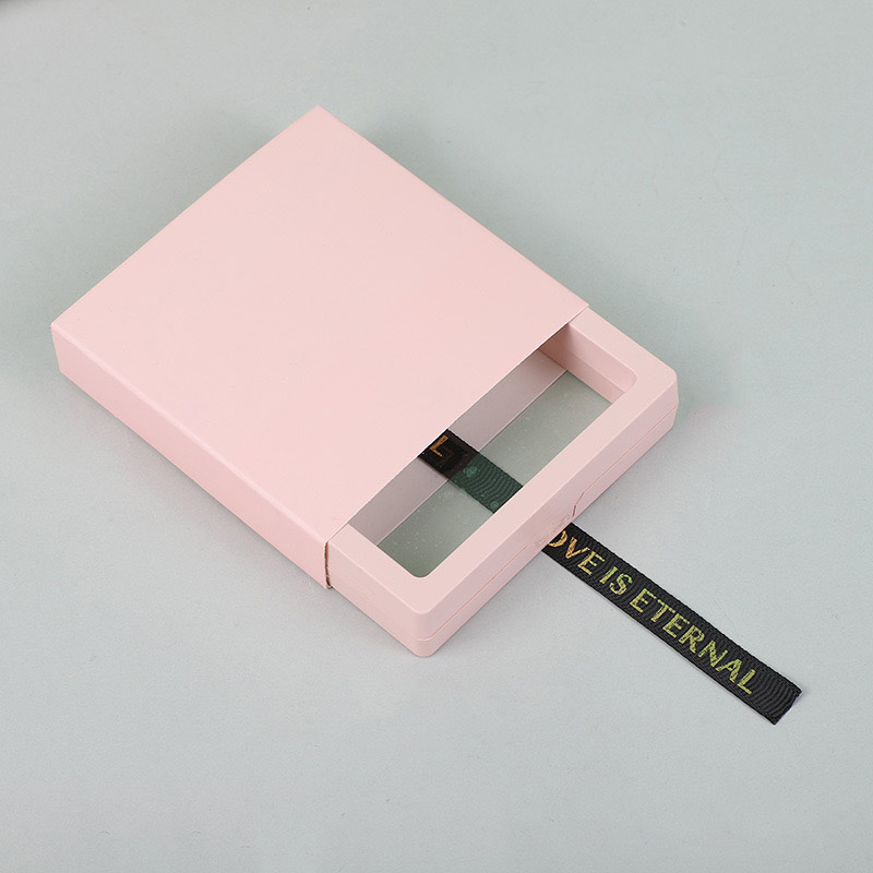 Manchon de papier rose + ruban