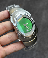 Reloj de pulsera para hombre de estilo cyberpunk único, esfera verde esmeralda, pulsera de eslabones integrada, caja ovalada minimalista, reloj de pulsera masculino a la moda