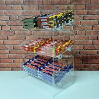 Chinesischer Hersteller Großhandel Modernes Umweltfreundliches 3-stufiges Acryl-Thekenregal für Süßwaren Schokolade Einzelhandel Snack-Regal
