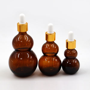 Bouteilles en verre compte-gouttes transparentes ambrées brillantes en forme de cantaloup de 15 ml, 20 ml, 30 ml, 50 ml pour huiles essentielles - Product Image 3