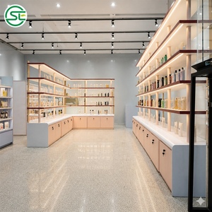Comptoir de caisse noir et blanc avec étagères éclairées par LED et armoire verrouillable pour magasin de beauté - Product Image 5