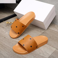 Pantoufles de luxe unisexes de haute qualité, pantoufles de créateur en cuir véritable, pantoufles tendance pour femmes