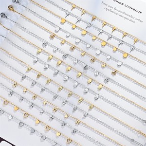 Colliers pendentifs raffinés en acier inoxydable avec breloques croix, cœur, étoile, feuille – Ensemble de bijoux unisexe pour usage quotidien - Product Image 1