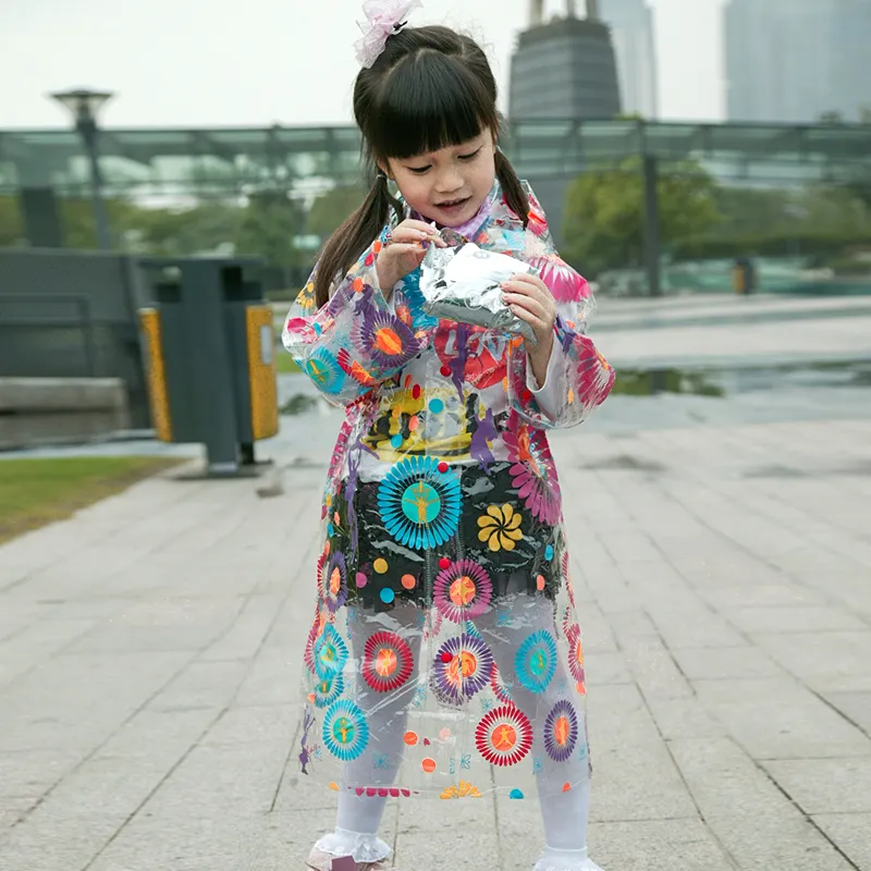 カラフルな花の印刷の女の子幼児ソフトプラスチックPVC透明クリア旅行キッズ卸売レインコート