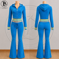 Nouveautés : Ensemble jogging 2 pièces pour femme, comprenant un crop top en tissu éponge et un pantalon, en coton et élasthanne, coupe ajustée, avec sweat à capuche.