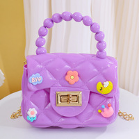 Neue Sommer-Umhängetaschen für Kinder Transparente PVC-Gelee-Geldbörsen Umhängetaschen Candy Patterned Mini Purses