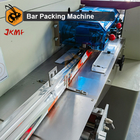 Machine à emballer automatique de production de protéines énergétiques à haute productivité Barre de protéines de céréales énergétiques faisant la machine à emballer