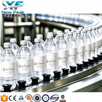 Nouvelle ligne de production de remplissage de liquides entièrement automatique 3 en 1 pour l'embouteillage d'eau minérale pour usine de remplissage d'eau