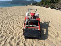 Machine de nettoyage de plage manuelle légère pour ramasser le sable, les coquillages, les pierres et les débris, idéale pour le nettoyage des plages en bord de mer