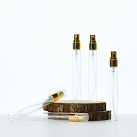 Emballage de soins de la peau de luxe Petites bouteilles en verre avec pulvérisateur en plastique doré 2ml 3ml 5ml 10ml Bouteille de parfum ronde